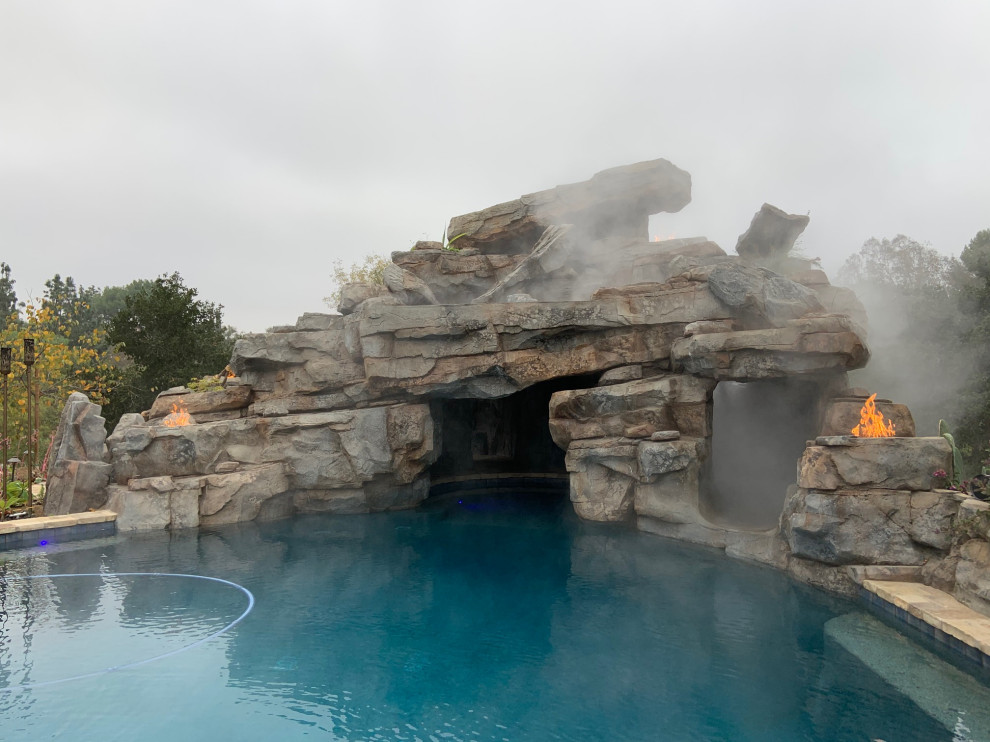 Slide/waterfall/cave with smoke/fire