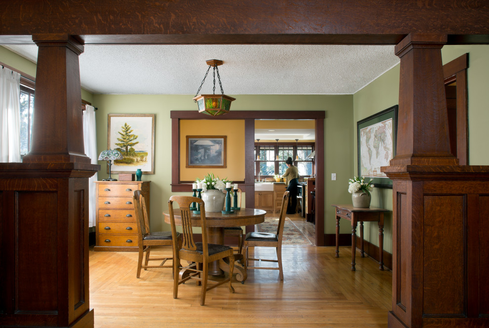 Example of an arts and crafts dining room design in Other