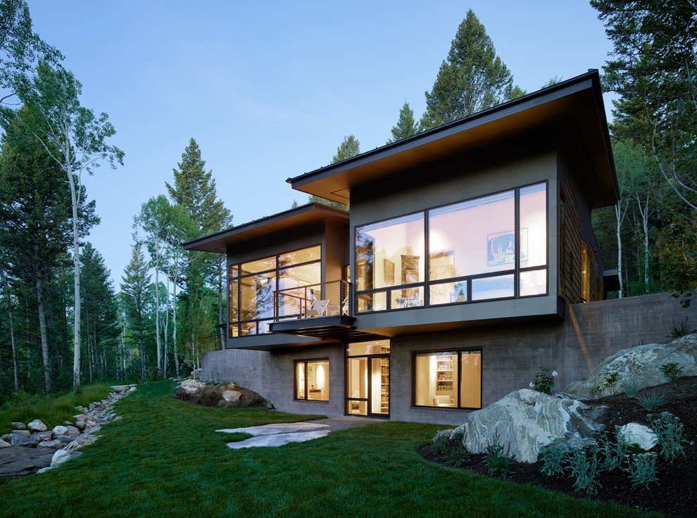 Design ideas for a two-storey exterior in Other with wood siding.