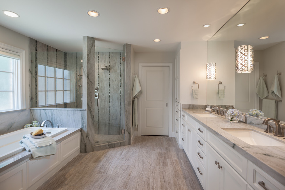 Design ideas for a large eclectic master bathroom in Houston with a drop-in sink, shaker cabinets, white cabinets, granite benchtops, a drop-in tub, a corner shower, green tile, white walls and porcelain floors.