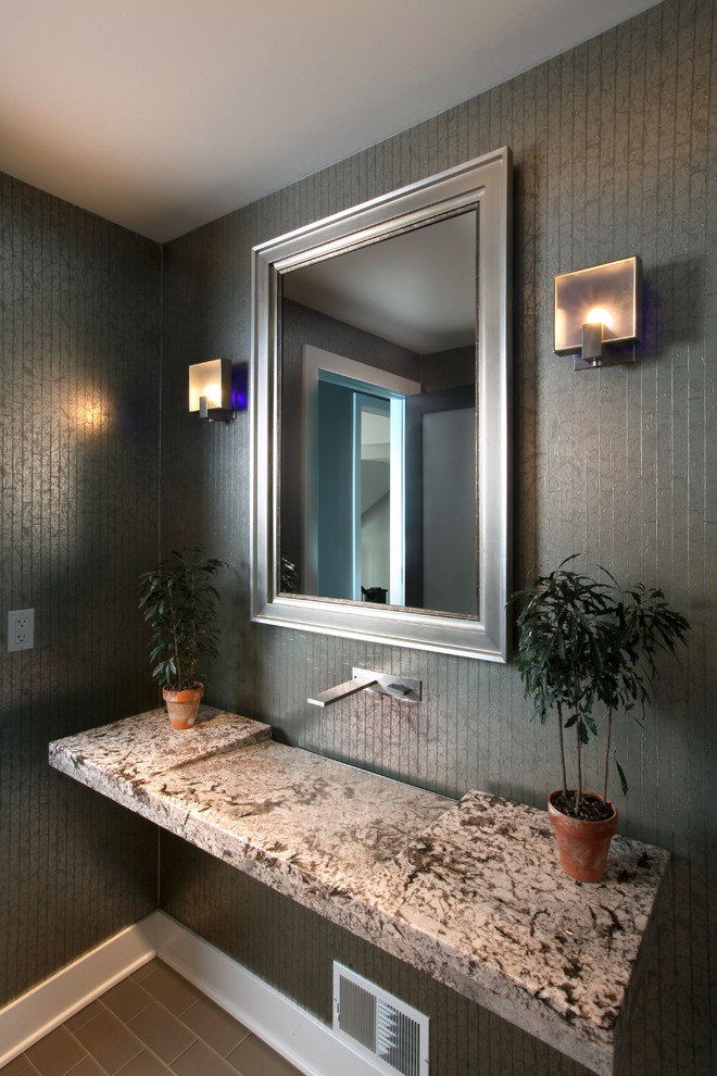 This is an example of a large contemporary bathroom in Grand Rapids with granite benchtops and a trough sink.