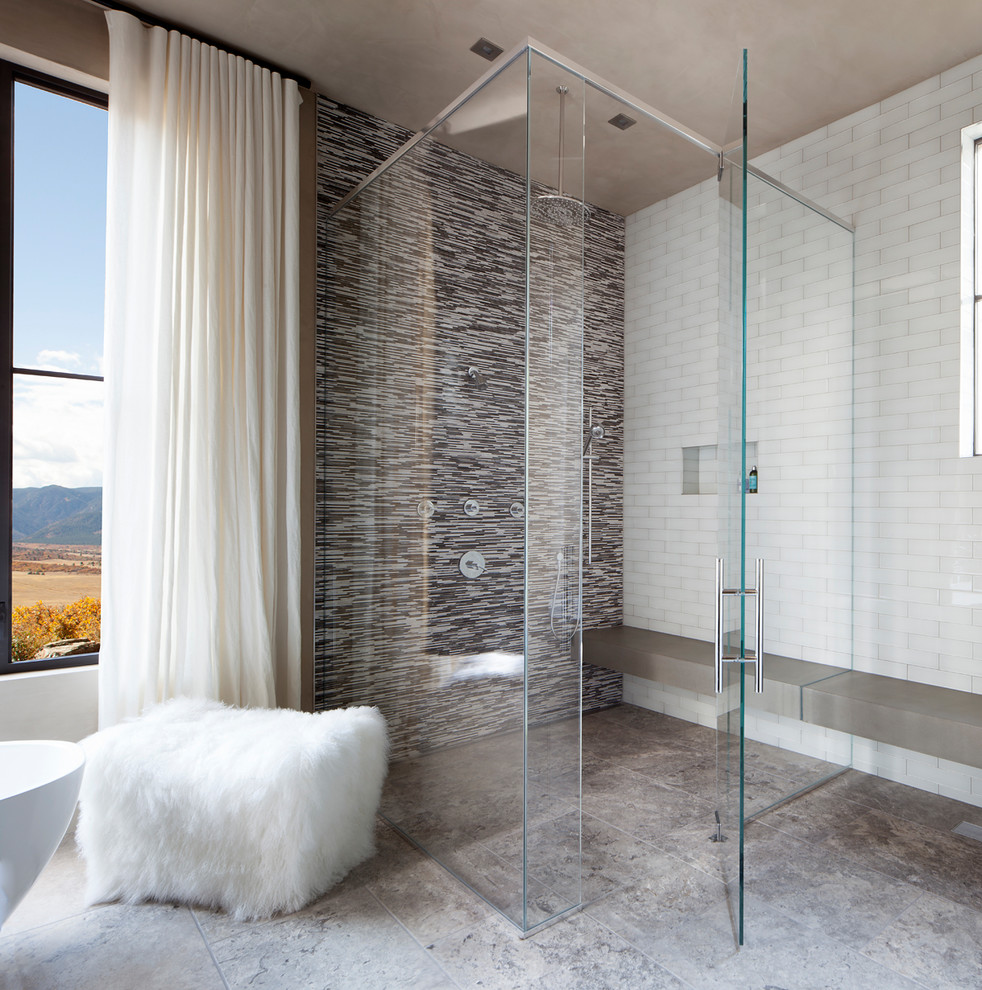 Design ideas for an expansive contemporary master bathroom in Denver with a corner shower, black and white tile, ceramic tile, white walls, ceramic floors, beige floor and a hinged shower door.