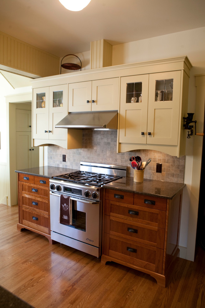 Design ideas for a traditional kitchen in Other with shaker cabinets and stainless steel appliances.