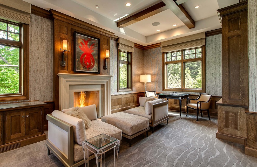 Photo of a transitional living room in Denver with grey walls and a standard fireplace.