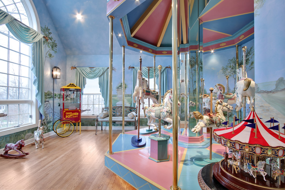 Design ideas for an eclectic gender-neutral kids' playroom in New York with light hardwood floors.