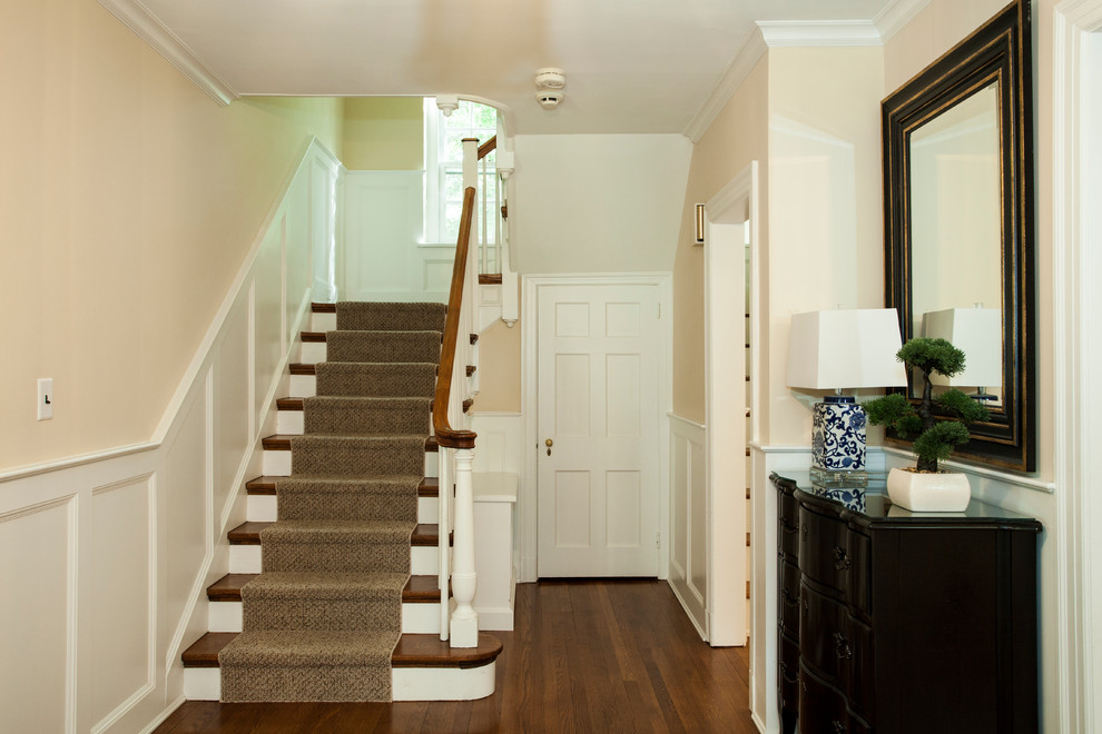 Inspiration for a mid-sized traditional foyer in Philadelphia with beige walls, medium hardwood floors, a single front door and a white front door.