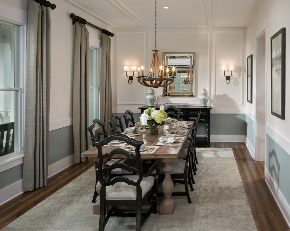 Inspiration for a large traditional separate dining room in Tampa with multi-coloured walls and medium hardwood floors.