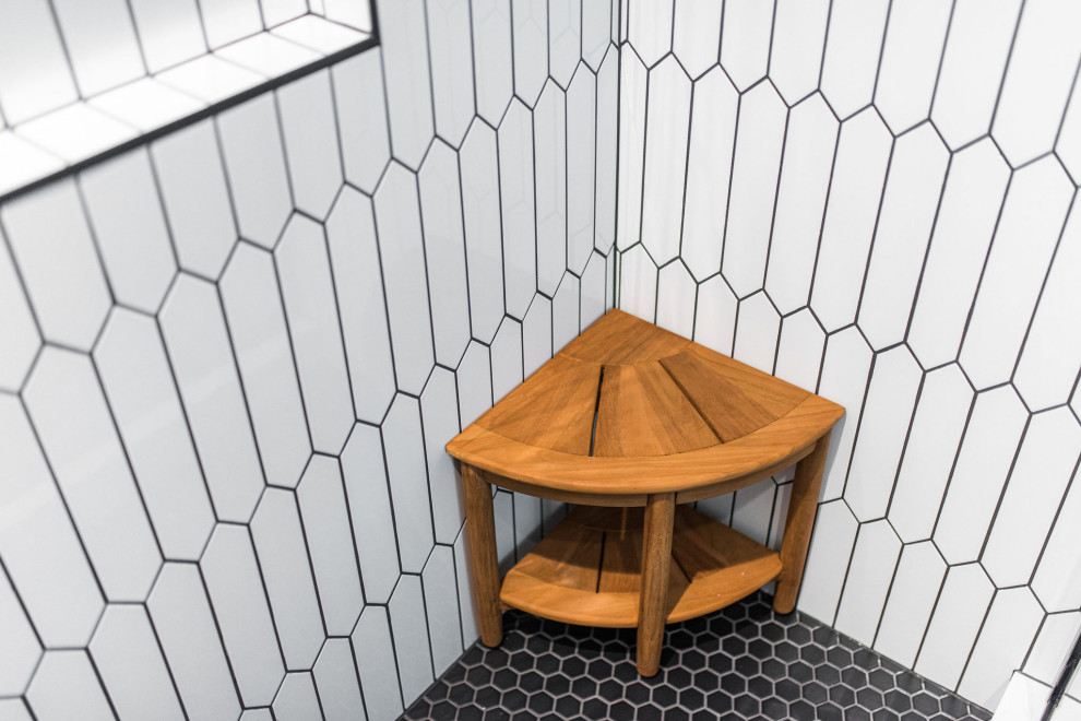 Inspiration for a transitional underground vinyl floor and beige floor home design remodel in Chicago with a bar and gray walls