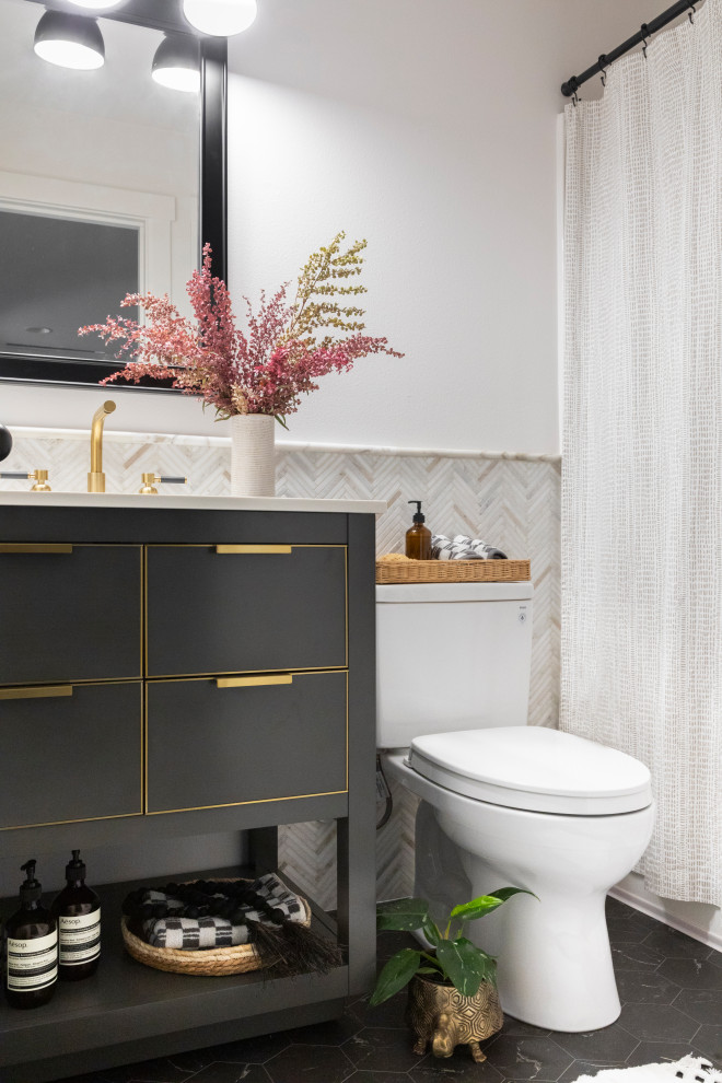 Design ideas for a bathroom in Seattle with recessed-panel cabinets, grey cabinets, a two-piece toilet, white tile, marble, white walls, an undermount sink, solid surface benchtops, black floor, white benchtops, a single vanity, a freestanding vanity and decorative wall panelling.