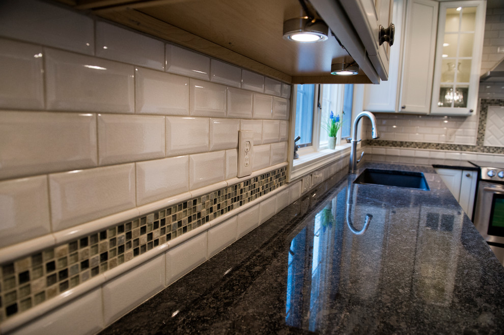 Example of a transitional kitchen design in Cleveland
