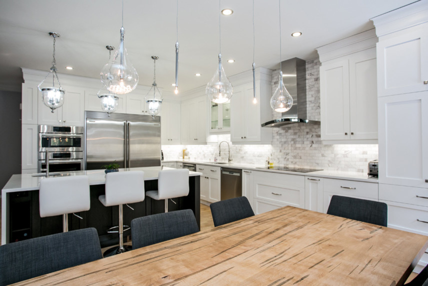 This is an example of a transitional kitchen in Ottawa.