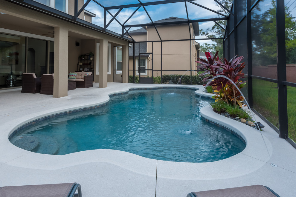 Example of a mid-sized transitional indoor custom-shaped pool fountain design in Orlando