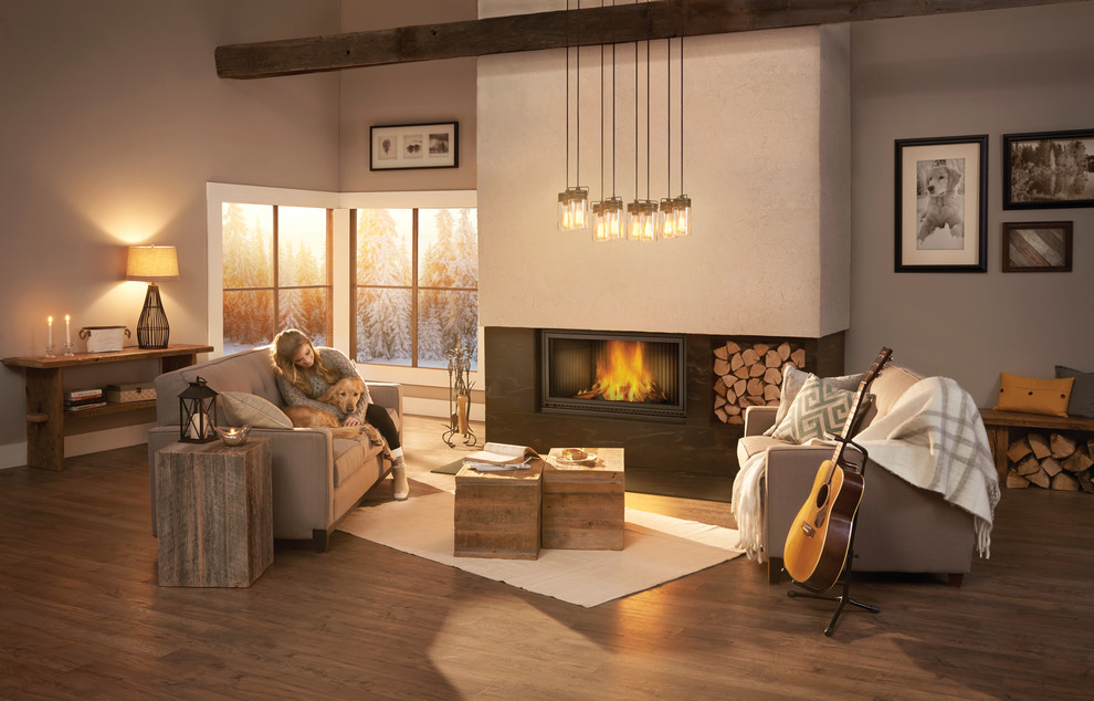 This is an example of a large contemporary open concept living room in Other with a music area, beige walls, medium hardwood floors, a standard fireplace, a metal fireplace surround, no tv and brown floor.