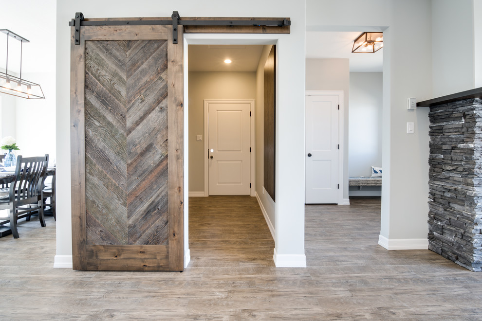 Example of a large transitional hallway design