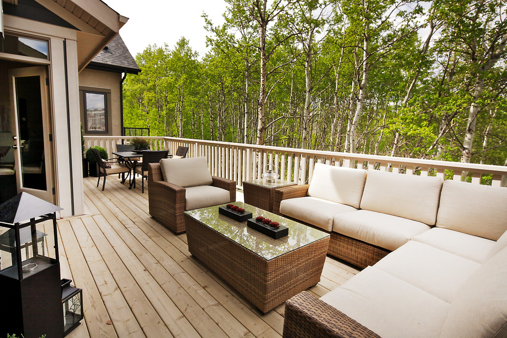This is an example of an eclectic patio in Calgary with decking.