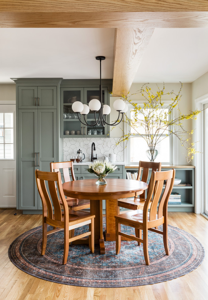 Example of a transitional dining room design in Boston