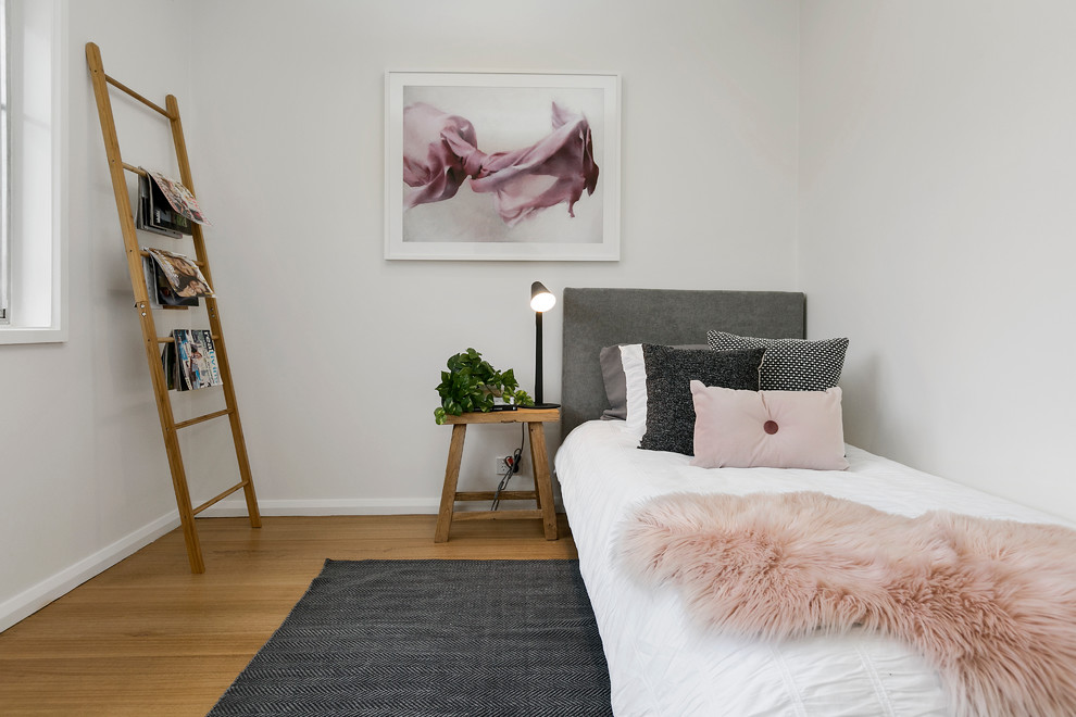 Example of a danish bedroom design in Hobart