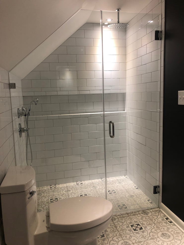 Small contemporary master bathroom in Charleston with furniture-like cabinets, white cabinets, an alcove shower, a one-piece toilet, white tile, ceramic tile, black walls, mosaic tile floors, an undermount sink, engineered quartz benchtops, a hinged shower door and yellow benchtops.