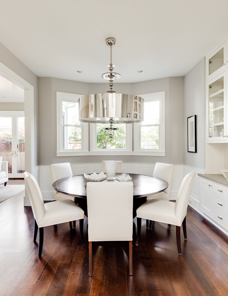 Mid-sized transitional separate dining room in San Francisco with grey walls, dark hardwood floors and brown floor.