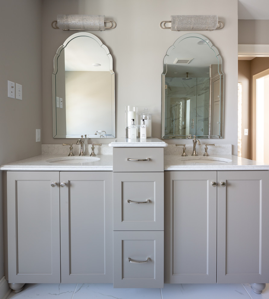 Example of a transitional master bathroom design in Minneapolis