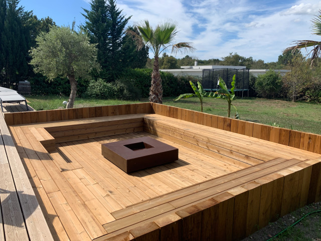 Am&eacute;nagement d&rsquo;un espace brasero dans un jardin &agrave; Gradignan modern-terrace