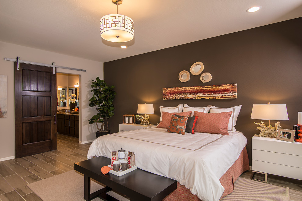 This is an example of a transitional bedroom in Phoenix.