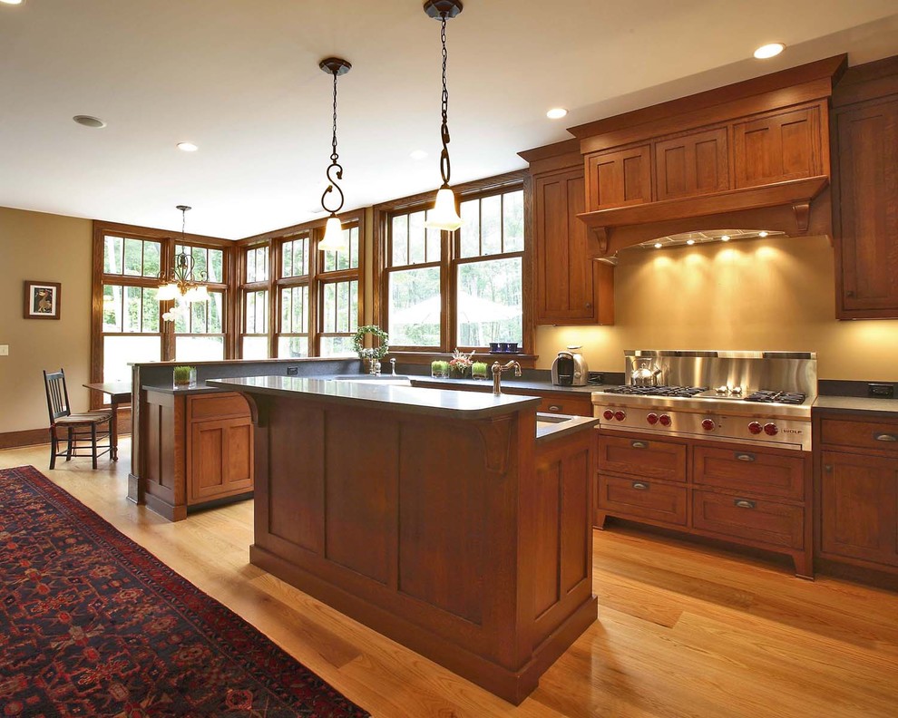 Arts and crafts kitchen in New York with stainless steel appliances.