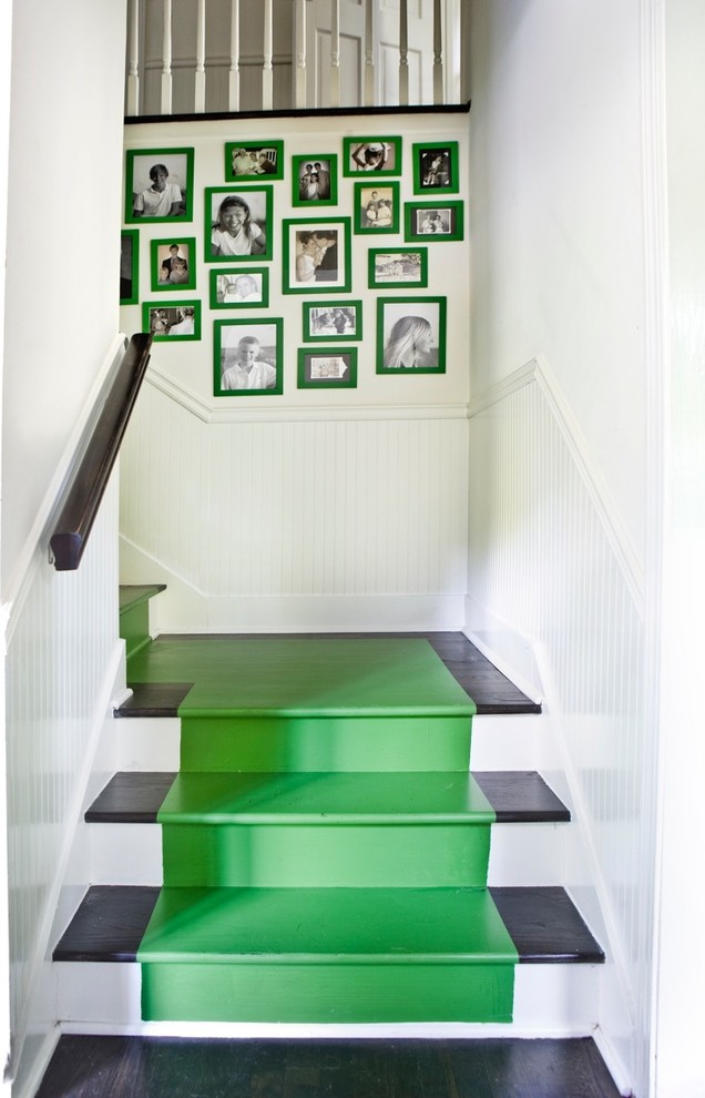 This is an example of a contemporary painted wood staircase in Atlanta with painted wood risers.