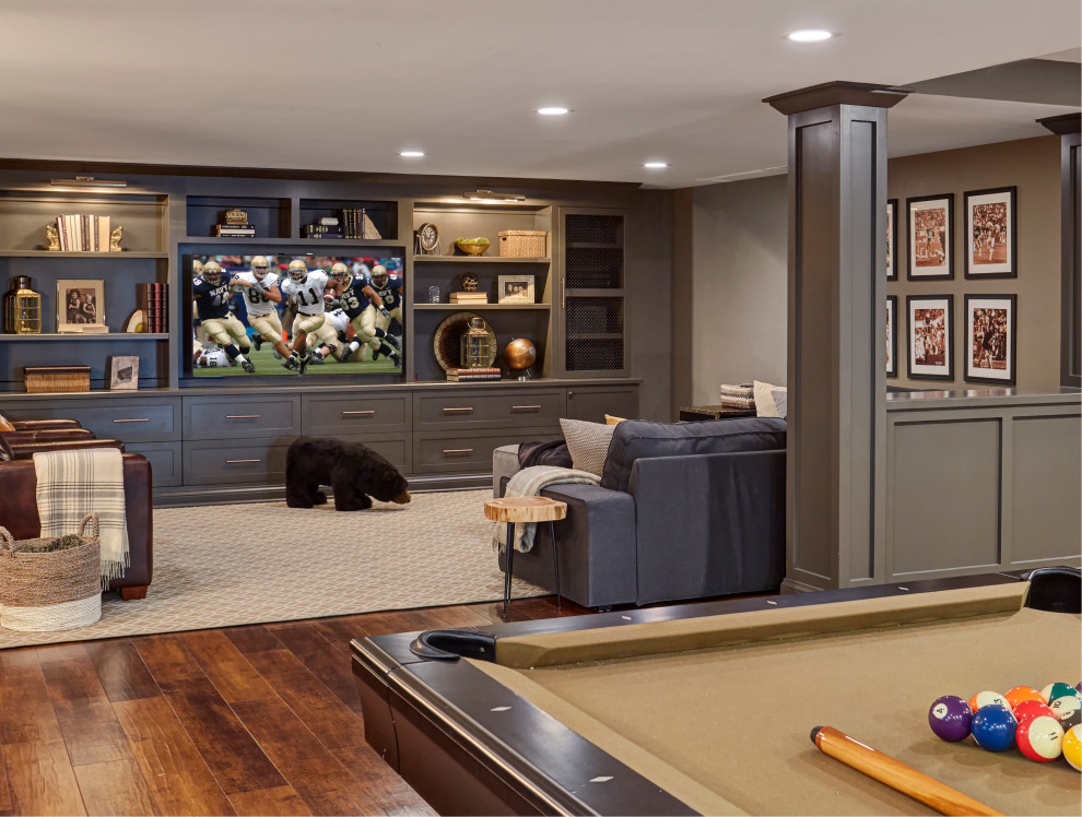 Transitional family room in Chicago with grey walls, dark hardwood floors and brown floor.