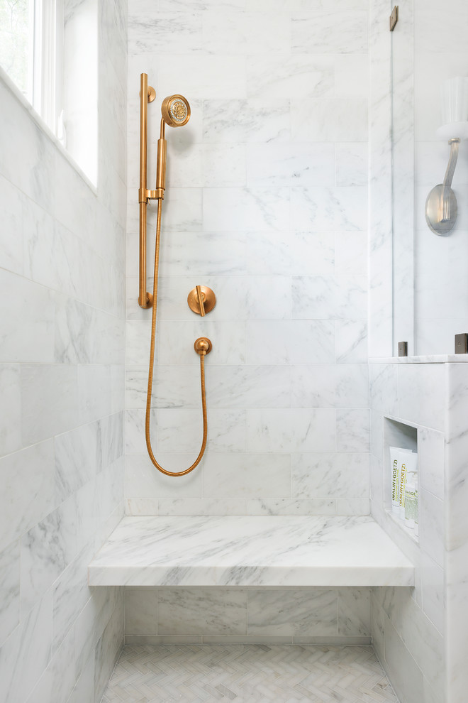 Small transitional master bathroom in Boston with shaker cabinets, white cabinets, an alcove shower, a wall-mount toilet, white tile, stone tile, white walls, mosaic tile floors, an undermount sink, marble benchtops, white floor and a hinged shower door.