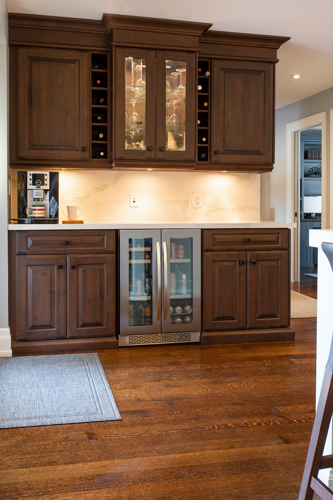 Inspiration for a transitional home bar remodel in Toronto