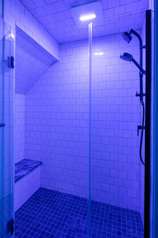 Alcove shower - large transitional master white tile and ceramic tile porcelain tile and white floor alcove shower idea in Columbus with a bidet, white walls and a hinged shower door