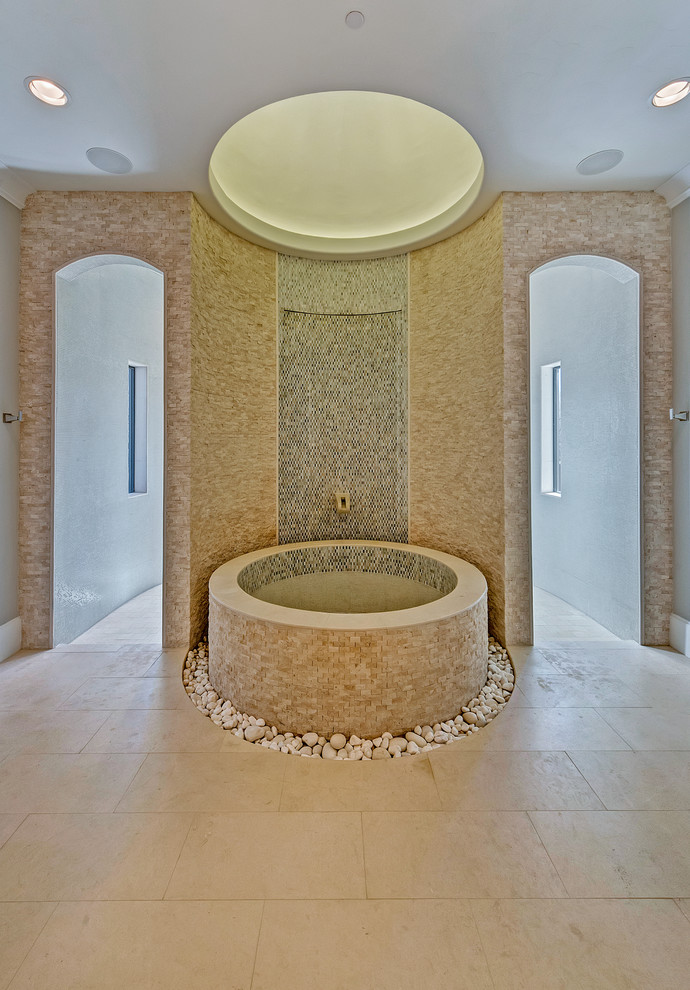 Inspiration for a huge transitional master white tile and stone tile limestone floor and white floor freestanding bathtub remodel in Orange County with shaker cabinets, dark wood cabinets, a one-piece toilet, gray walls, a drop-in sink and quartzite countertops