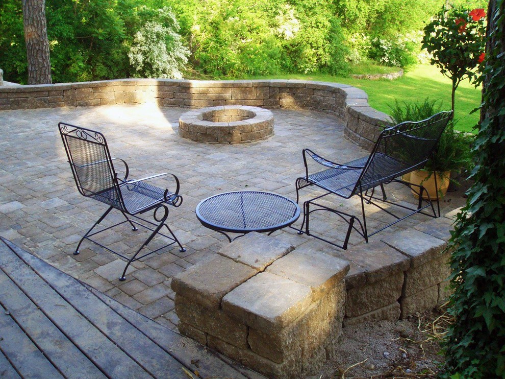 Mid-sized arts and crafts backyard patio in Other with a fire feature, concrete pavers and no cover.