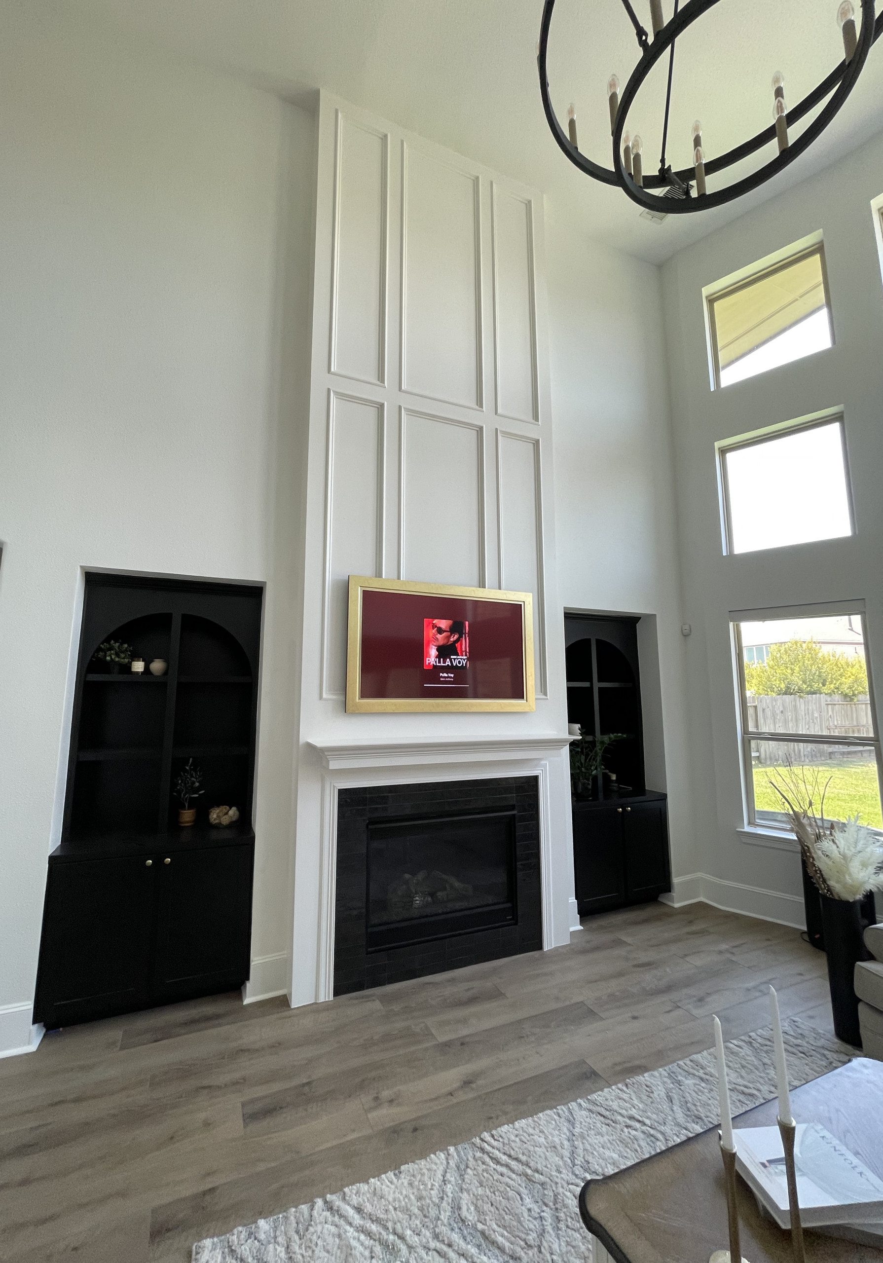 Fireplace with Wood Paneling Fireplace and Custom Built-in Cabinets in Cypress,