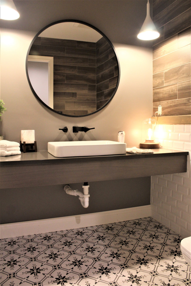 Small transitional bathroom in Detroit with grey cabinets, multi-coloured tile, ceramic tile, engineered quartz benchtops, grey benchtops, a single vanity and a floating vanity.
