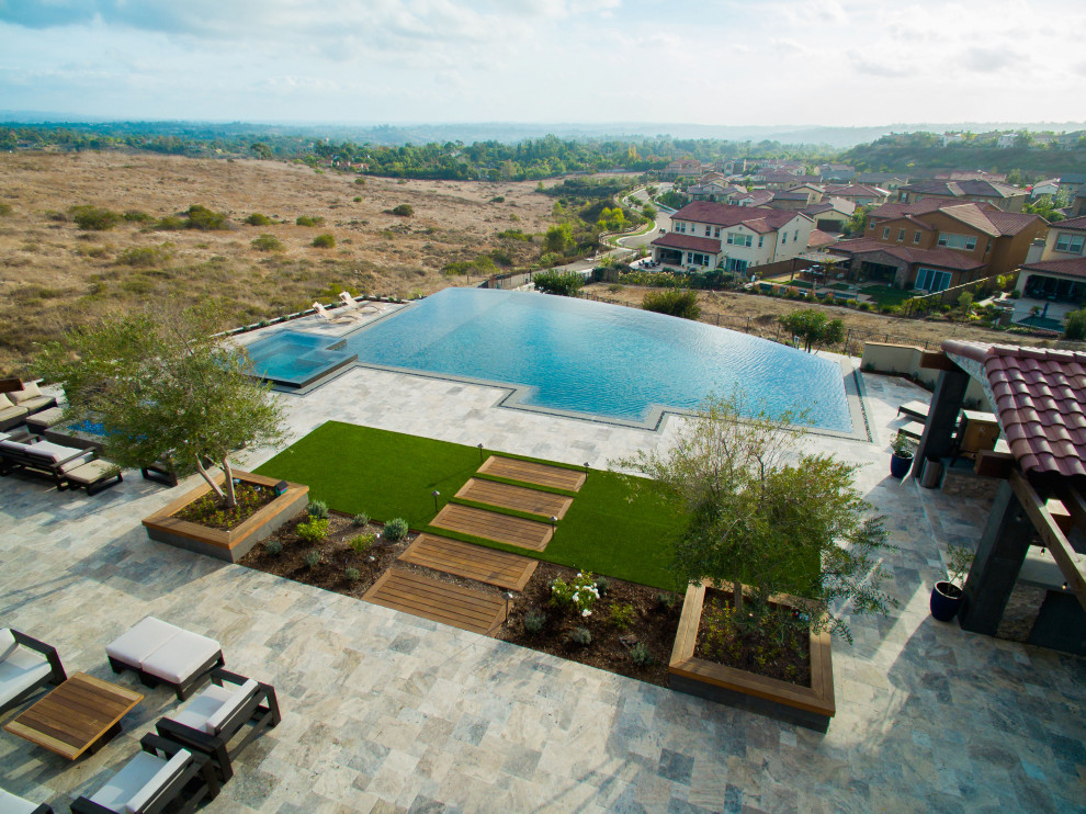 Gorgeous Infinity Pool with Multiple Outdoor Living Spaces ...