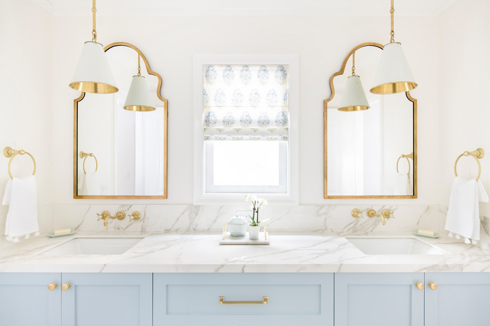 This is an example of a small beach style bathroom in Los Angeles with grey cabinets, white tile, ceramic tile, an undermount sink, white benchtops and a single vanity.