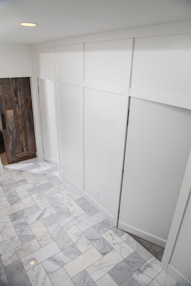 Design ideas for a large contemporary master bathroom in Indianapolis with flat-panel cabinets, dark wood cabinets, an alcove shower, gray tile, white tile, stone tile, white walls, marble floors, an undermount sink, engineered quartz benchtops, multi-coloured floor and an open shower.