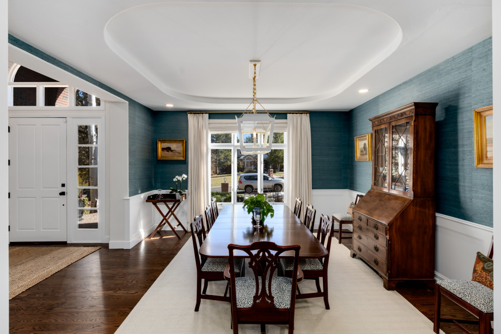 Example of a transitional dining room design in Denver