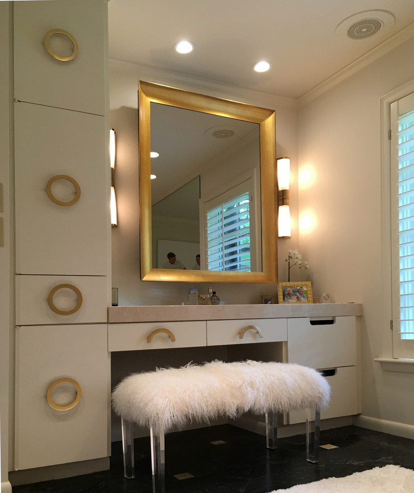 Design ideas for a mid-sized contemporary master bathroom in Dallas with flat-panel cabinets, white cabinets, a drop-in tub, an alcove shower, a two-piece toilet, white tile, porcelain tile, white walls, marble floors, a wall-mount sink, limestone benchtops, green floor and a hinged shower door.