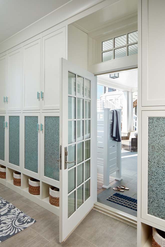 Beach style mudroom photo in Chicago with a glass front door