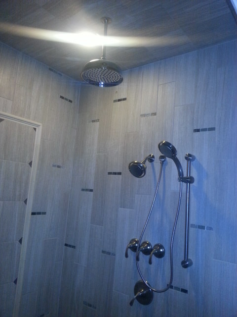 Walkin Shower with multiple shower heads and sprays