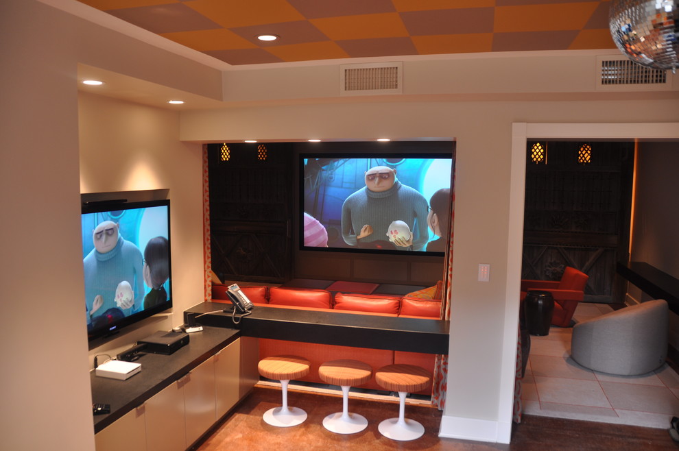 Large contemporary enclosed home theatre in Chicago with beige walls, a projector screen and concrete floors.