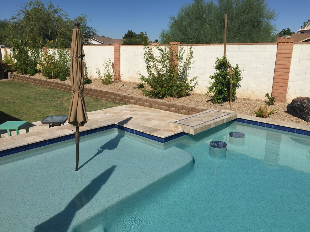 Design ideas for a traditional pool in Phoenix.