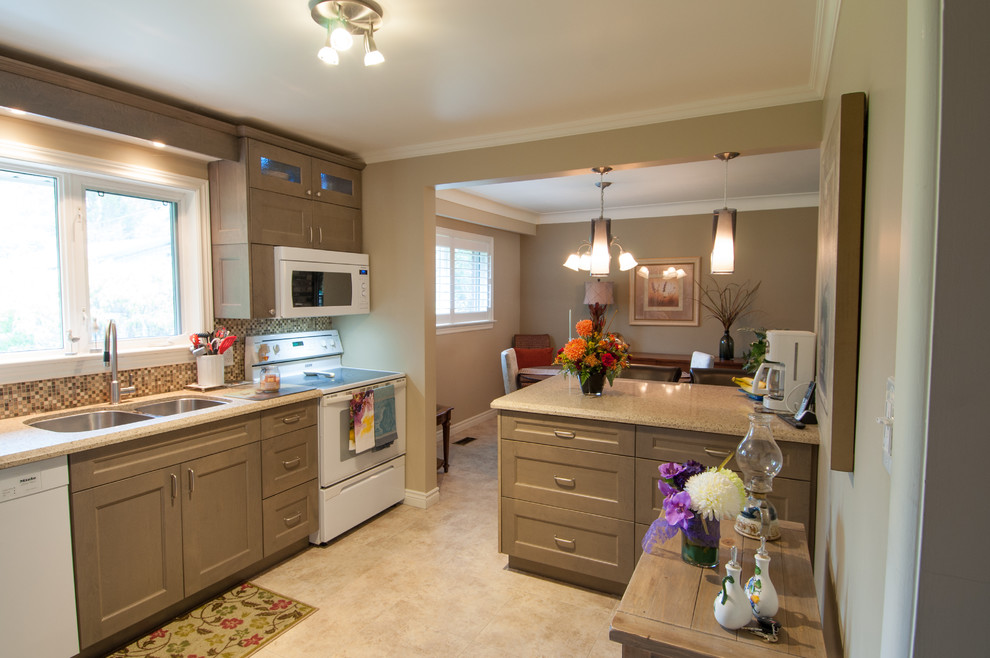 Mid-sized transitional u-shaped vinyl floor and beige floor eat-in kitchen photo in Toronto with a double-bowl sink, shaker cabinets, distressed cabinets, quartzite countertops, multicolored backsplash, mosaic tile backsplash, white appliances and a peninsula