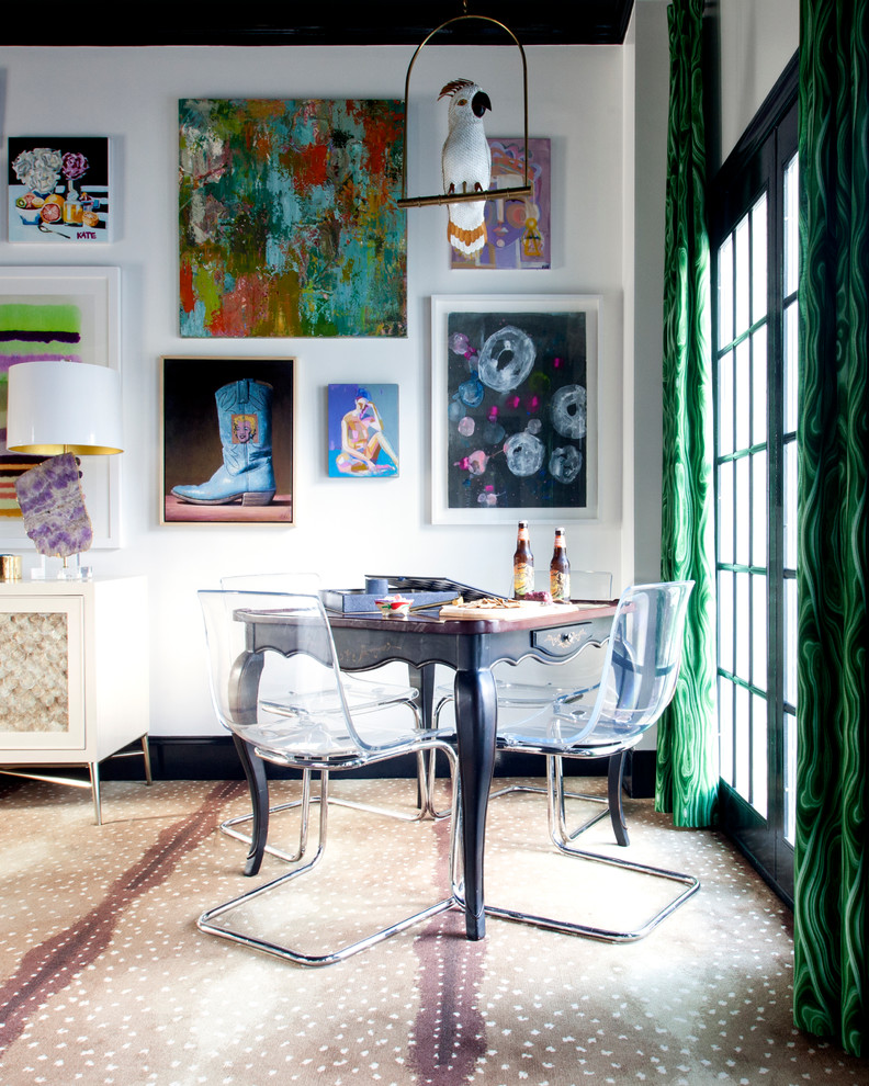 Eclectic open plan dining in Charlotte with white walls and carpet.