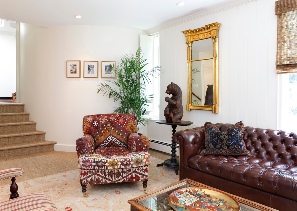 This is an example of an eclectic family room in Philadelphia with white walls.