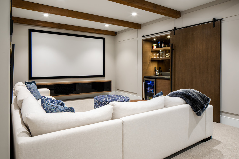 Country enclosed home theatre in Vancouver with beige walls, carpet, a projector screen and beige floor.