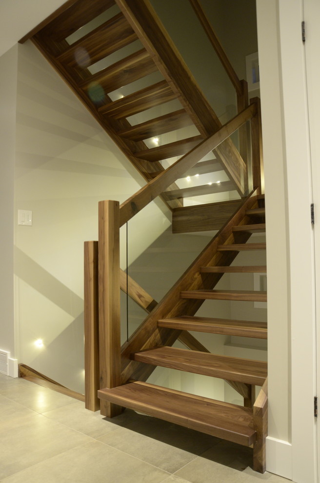 Inspiration for a mid-sized modern wooden l-shaped open and glass railing staircase remodel